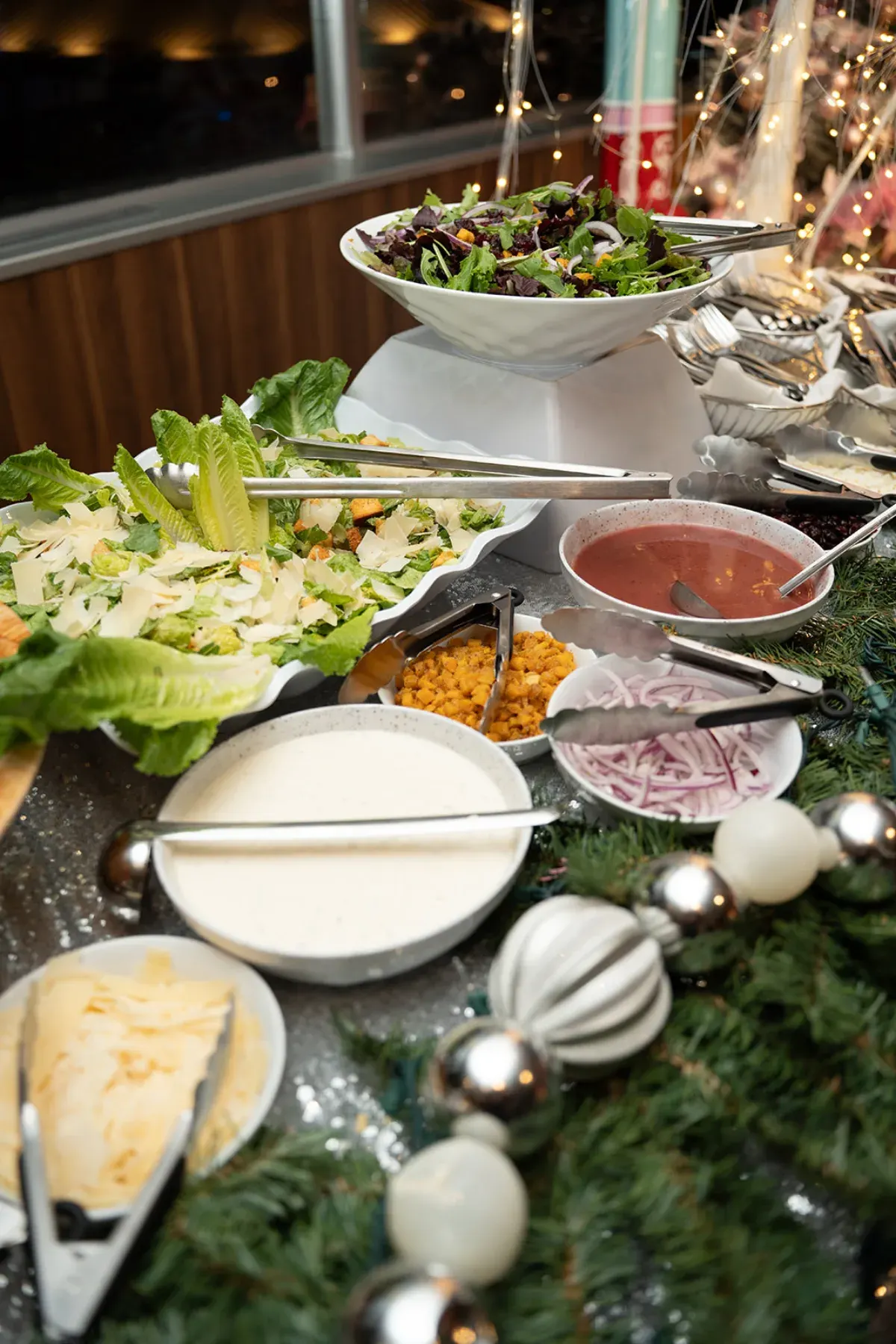 The holiday buffet dressed in pine garland