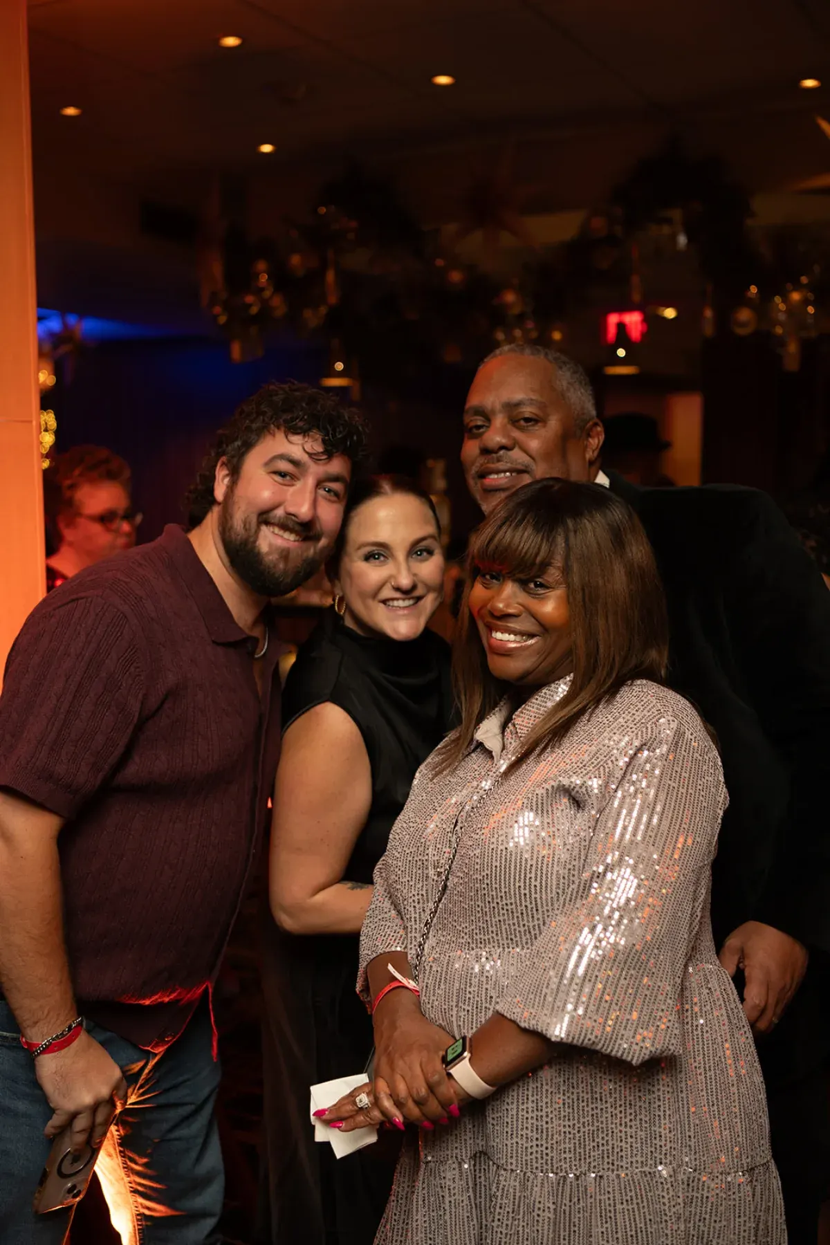 Guests mingling at an office holiday party